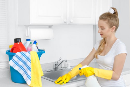 Cleaner working through a Sutton house with attention to detail
